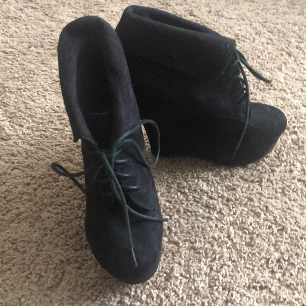 Wedged black booties